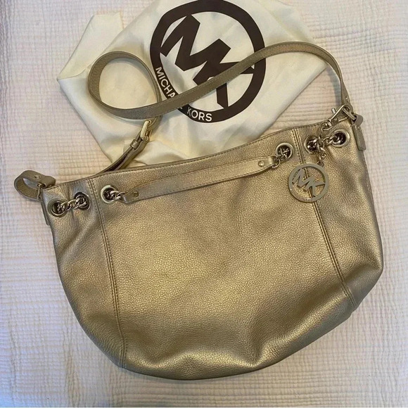 Michael Kors Handbags - Metallic Gold Michael Kors Jet Set Bag